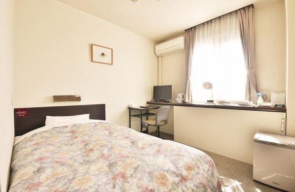 Hotel Select Inn Tuyama Quarto foto